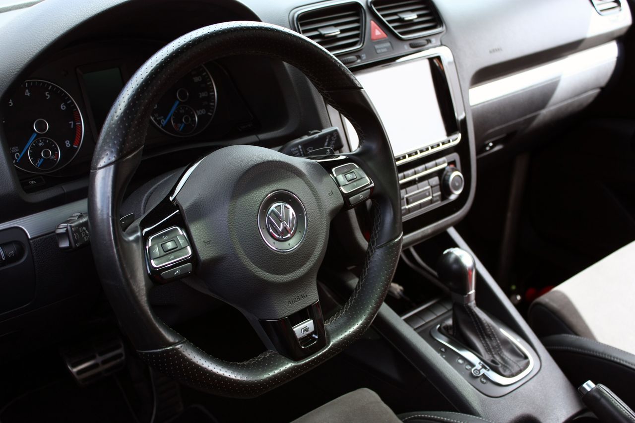 The Art of Drawing Readers In: Your attractive post title goes here Explore the sleek interior and dashboard of a modern Volkswagen car, showcasing advanced features and design.